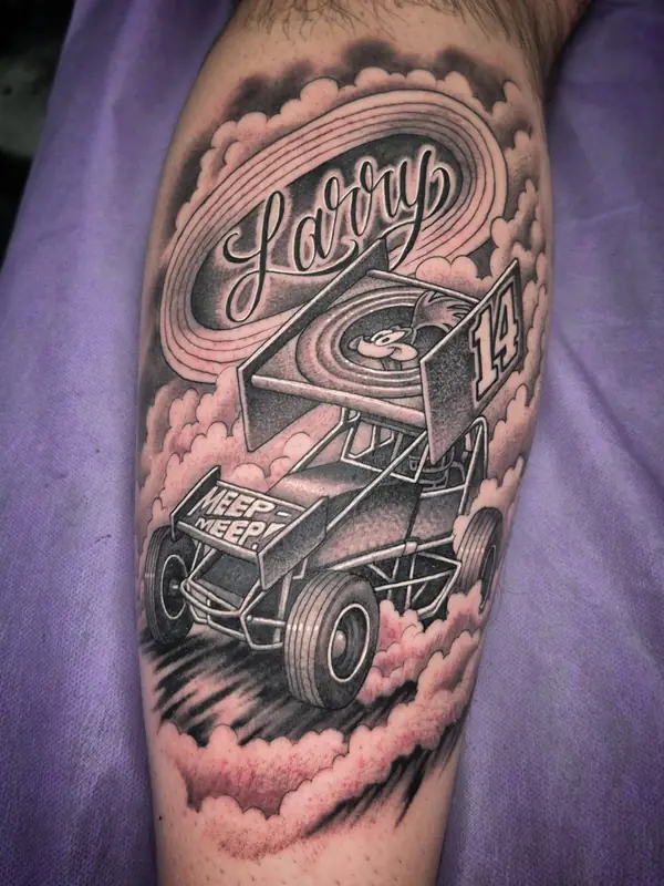 Black and gray sprint car memorial tattoo by Chris Carp at Heart & Sword Tattoo