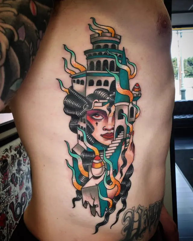 Neo-traditional woman with lighthouse headdress by Chris Carp at Heart & Sword Tattoo