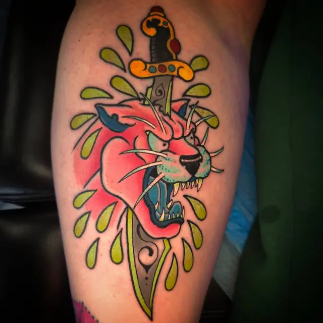 Neo-traditional panther and dagger by Chris Carp at Heart & Sword Tattoo