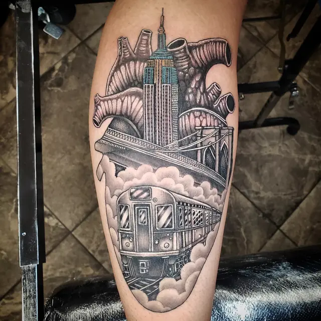 Black and gray NYC skyline heart and subway train by Chris Carp at Heart & Sword Tattoo