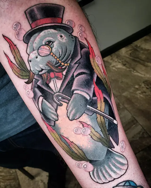 Gentleman manatee in a top hat by Chris Carp at Heart & Sword Tattoo