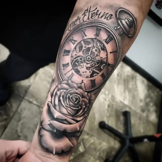 Black and gray pocket watch and rose by Chris Carp at Heart & Sword Tattoo