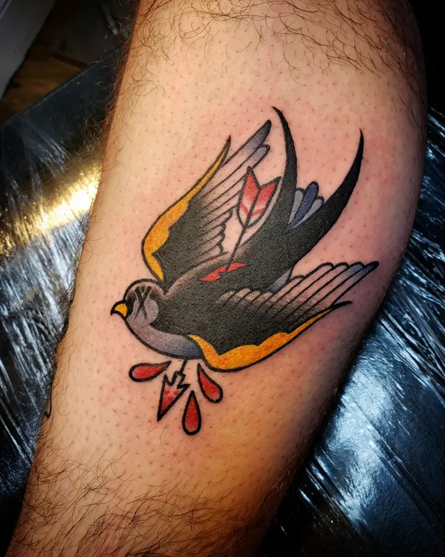 Traditional swallow tattoo by Chris Carp at Heart & Sword Tattoo