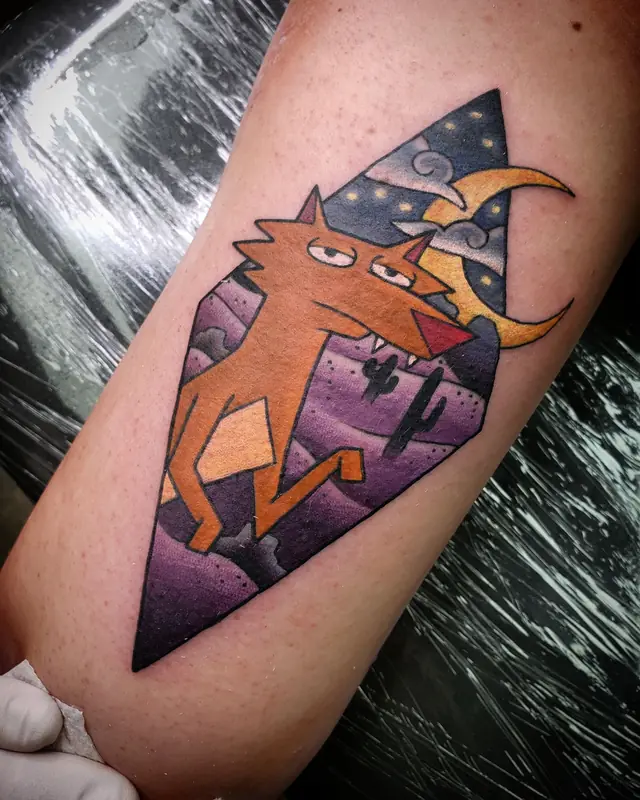 Cartoon coyote in a desert night scene by Chris Carp at Heart & Sword Tattoo