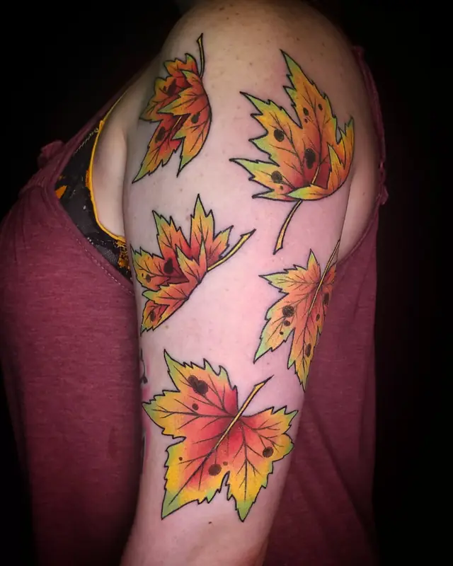 Color autumn maple leaves shoulder tattoo by Chris Carp at Heart & Sword Tattoo