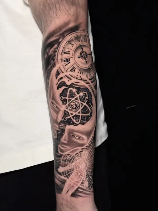 Black and gray clock and atom sleeve by Dina at Heart & Sword Tattoo